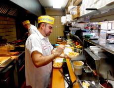 Hard working kitchen staff at Franksville Restaurant in Chicago