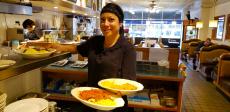 Friendly server at George's Family Restaurant in Oak Park