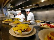 Busy kitchen crew at George's Family Restaurant in Oak Park