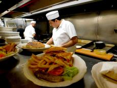 Busy kitchen staff at George's Family Restaurant in Oak Park