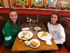 Friends enjoying breakfast at Georgie V's Pancakes & more in Northbrook