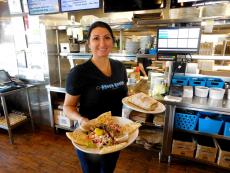 Friendly server at the Greek Feast Restaurant in Northbrook