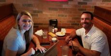 Couple enjoying dinner at Jameson's Charhouse in Arlington Heights