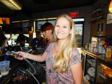 Friendly bar server at Jimmy D's District Restaurant in Arlington Heights