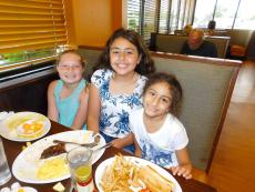 Young guests enjoying lunch at Kappy's American Grill in Morton Grove