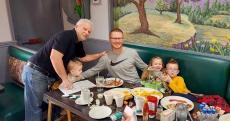 Family enjoying breakfast at Les Brothers Restaurant in Oak Lawn