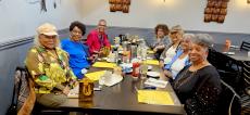 Friends enjoying lunch at Les Brothers Restaurant in Oak Lawn