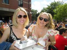 Friends ready to enjoy food at the Lincoln Park Greek Fest in Chicago