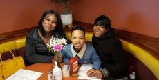 Family enjoying breakfast at Lumes Pancake House in Chicago