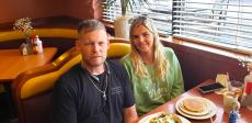 Couple enjoying breakfast at Lumes Pancake House in Chicago