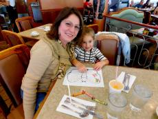 Mom and daughter enjoying breakfast at Lumes Pancake House in Orland Park