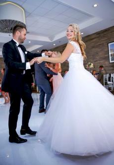 Bride & Groom Celebrating at Mirage Restaurant & Banquets in Schiller Park