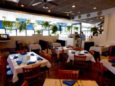The cozy dining room at Mykonos Greek Restaurant in Niles