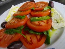 Feta cheese and tomato appetizer at Mykonos Greek Restaurant in Niles