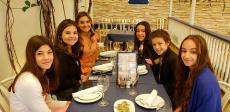 Friends enjoying lunch at Mykonos Greek Restaurant in Niles