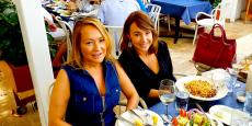 Friends enjoying lunch at Mykonos Greek Restaurant in Niles