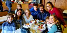 Family enjoying lunch at Nick's Drive In Restaurant in Chicago