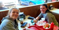 Friends enjoying lunch at Nick's Drive-In Restaurant in Chicago