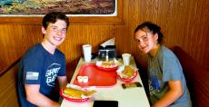 Friends enjoying lunch at Nick's Drive-In Restaurant in Chicago