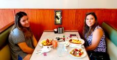 Mom and daughter enjoying breakfast at Niko's Breakfast Club in Romeoville