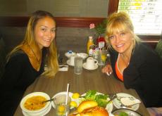 Family enjoying lunch at Omega Restaurant & Pancake House in Schaumburg