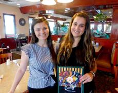 Friends enjoying breakfast at Omega Restaurant & Pancake House in Downers Grove