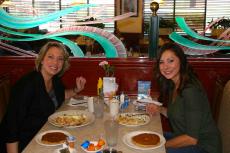 Friends enjoying breakfast at Omega Restaurant & Pancake House in Downers Grove