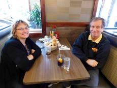 Couple enjoying lunch at Omega Restaurant & Pancake House in Schaumburg