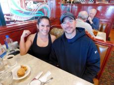 Couple enjoying breakfast at Omega Restaurant & Pancake House in Downers Grove