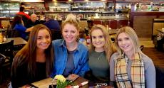 Friends enjoying lunch at Omega Restaurant & Pancake House in Schaumburg