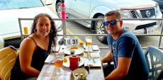 Couple enjoying the outdoor patio at Papagalino Cafe & Pastry Shop in Niles