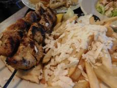 Souvlaki with greek-style fries at Papagalino Cafe & Pastry Shop in Niles