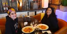 Friends enjoying lunch at Papagalino Cafe & Pastry Shop in Niles