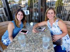 Friends enjoying the outdoor patio at Papagalino Cafe & Pastry Shop in Niles