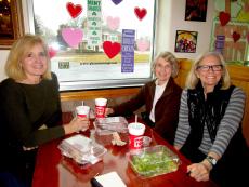 Friends enjoying lunch at Photo's Hot Dogs in Palatine