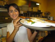 Friendly server at Plainfield's Delight Restaurant in Plainfield