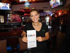 Friendly server in the spacious lounge at Pub 83 in Long Grove