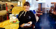 Friendly server at QP Greek Food With a Kick in Hoffman Estates