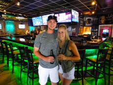 Couple enjoying late lunch & drinks at Rocky's American Grill in Prospect Heights