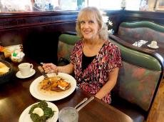 Customer enjoying dinner at Rose Garden Cafe in Elk Grove Village