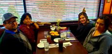 Family enjoying dinner at Rose Garden Cafe in Elk Grove Village