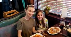 Sisters enjoying dinner at Rose Garden Cafe in Elk Grove Village