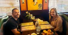 Couple enjoying dinner at Rose Garden Cafe in Elk Grove Village