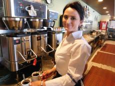 Friendly server with fresh coffee at Maxfield's Restaurant in Lombard