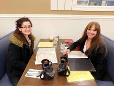 Friends enjoying breakfast at Southern Belle's Pancake House in Carpentersville