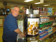 Friendly host Ted serving up Spartan Brother's famous Olive Oil from the tap