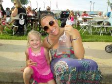 Mom and daughter enjoying the St. Demetrios Greek Fest in Elmhurst