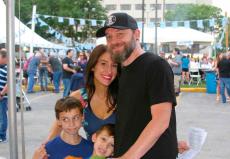 Family enjoying the Lincoln Park Greek Fest at St. Demetrios in Chicago