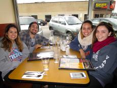 Friends enjoying breakfast at Stacked Pancake House in Oak Lawn