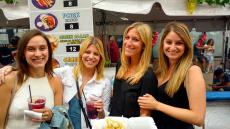 Friends enjoying the annual Taste of Greek Town on Halsted St. in Chicago